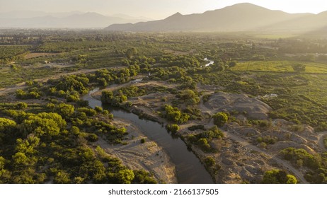 A Sunset In The Mapocho River