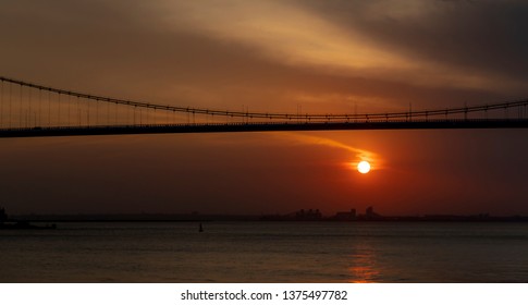 The Sunset In Maputo From The Port