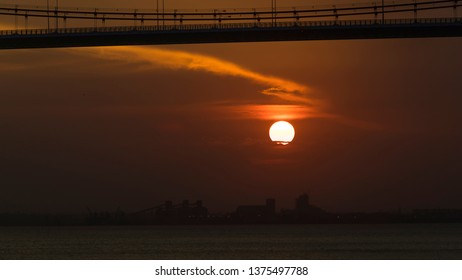 The Sunset In Maputo From The Port