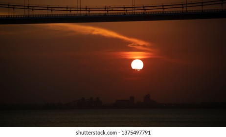 The Sunset In Maputo From The Port