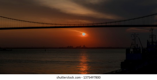 The Sunset In Maputo From The Port