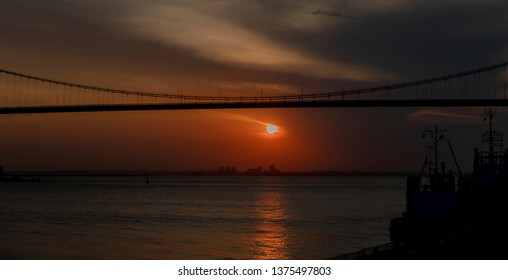 The Sunset In Maputo From The Port