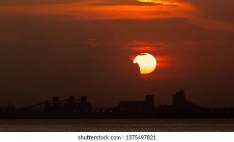 The Sunset In Maputo From The Port