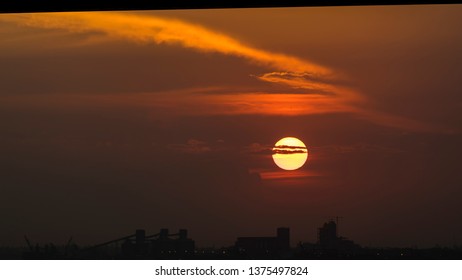 The Sunset In Maputo From The Port