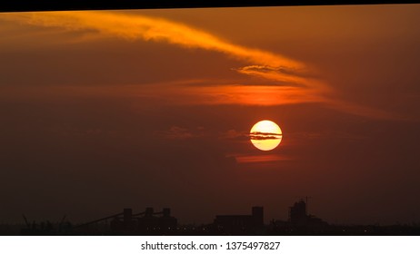 The Sunset In Maputo From The Port