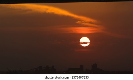 The Sunset In Maputo From The Port