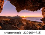 Sunset at Mirador de la Tarta, with view on the Teide volcano and low clouds, on Tenerife, Spain 