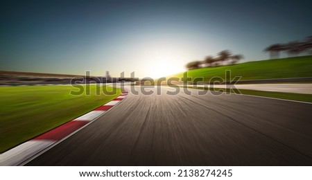 Sunset motion blurred race track.