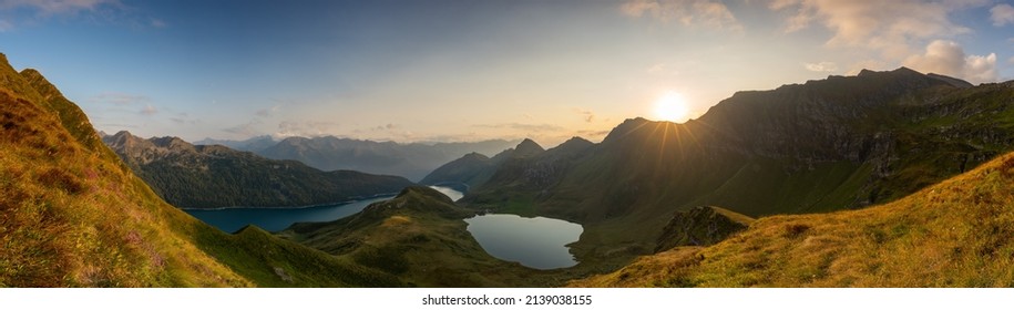 Sunset at a mountain lake in the swiss mountains