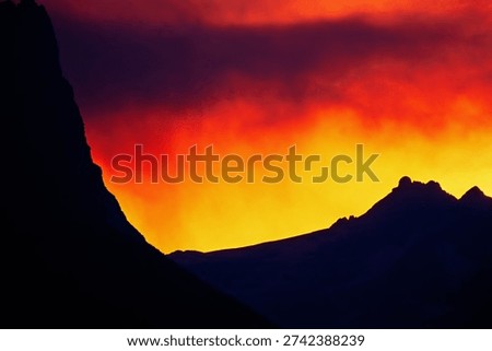 Sunset at a mountain landscape with cloudscape sky