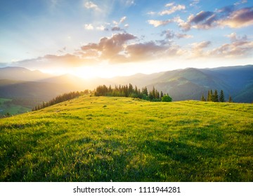 Sunset in the mountain valley. Beautiful natural landscape in the summer time - Shutterstock ID 1111944281