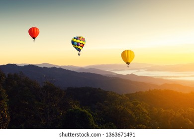 Sunset Mountain View has a floating balloon in the sky. - Shutterstock ID 1363671491