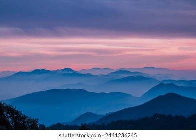 Sunset in the mountains. Dawn Majesty: High-Resolution Mountains with Soothing Natural Colors and Majestic Texture. Scenic views of Himalayan ranges of Kumaun region, Uttarakhand, India.  - Powered by Shutterstock