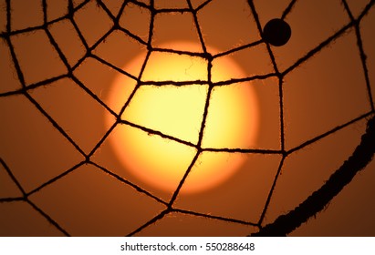 Sunset with net of dreamcatcher