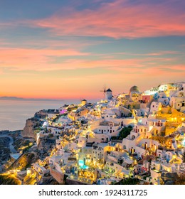Sunset night view of Famous Greek village Oia on Santorini island in Greece. Santorini is iconic travel destination in Greece, famous of its sunsets and traditional white architecture