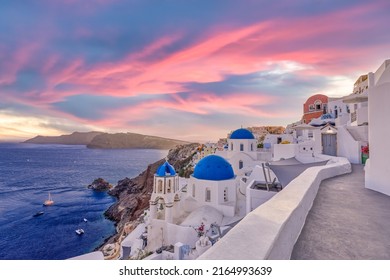 Sunset night view of traditional Greek village Oia on Santorini island in Greece. Santorini is iconic travel destination in Greece, famous sunset point landscape and traditional white architecture
