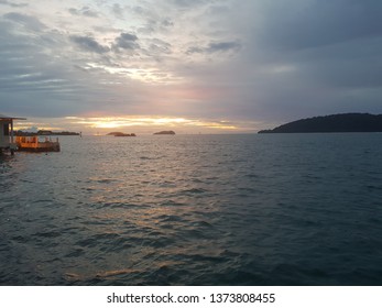 Sunset ocean view with beautiful tiny island