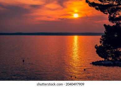 Sunset on the adriatic sea in the summer in Crikvenica, Croatia