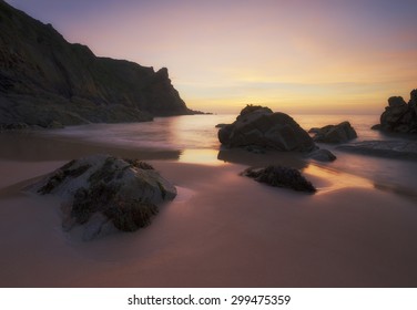 Sunset On A Beach In Jersey, Channel Islands, UK