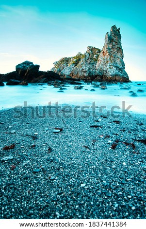 Similar – Image, Stock Photo puddle with reflection of stones with green seaweed on the beach