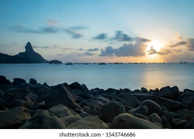 
sunset on the beach with the sky and clouds