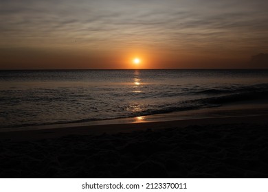 Sunset On The Beautiful Open Sea Beach