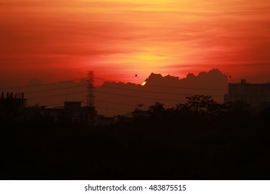 Sunset on cloud over red sky background