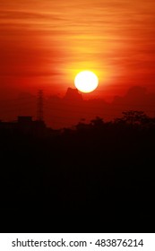Sunset on cloud over red sky background