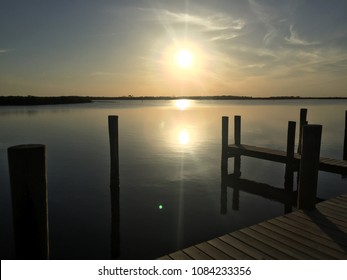 Sunset On The Docks Of Mosquito Bay, Florida