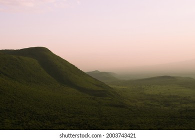 Sunset on an evening overlooking the slopes of the Great Rift Valley landscape