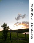 Sunset on the farm with clouds