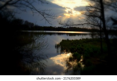 Sunset on the lake with clouds