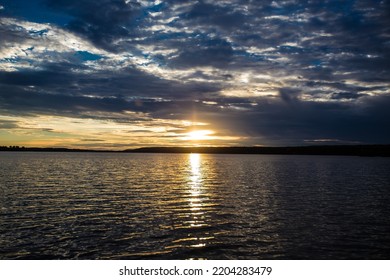 Sunset on a lake with clouds