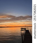 sunset on Lake Koshkonong with fishing pier