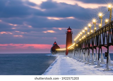 Sunset On Lake Michigan At Grand Haven Lighthouse, In Winter 