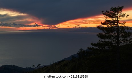 Sunset on the Ligurian Riviera seen from Monte Fasce. Italy