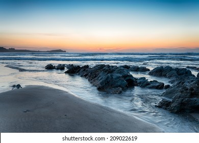Sunset on Lusty Glaze beach at Newquay in Cornwall - Shutterstock ID 209022619