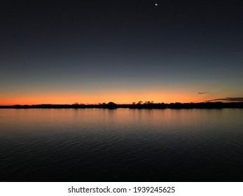 Sunset On The Madeira River In The Amazon.