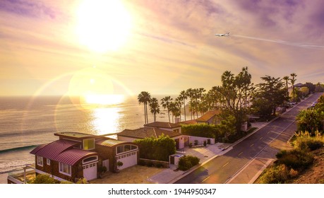 Sunset On Malibu Coast,beautiful Palms And Houses

