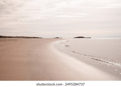 Sunset on the New England Coast with pink and coral hues.   - Powered by Shutterstock