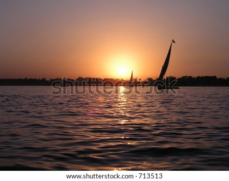 Similar – Silhouette einer ägyptischen Stadt mit Segelboot im Vordergrund und pastellrosa-lila farbenem Himmel, Sonnenuntergangsstimmung