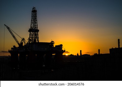sunset on the oil rig