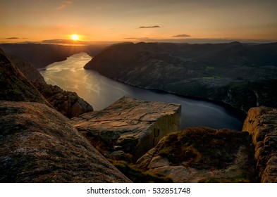 Sunset on Preikestolen over Lysefjorden, Norway - Shutterstock ID 532851748
