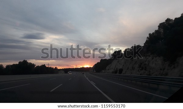 Sunset on the\
road.