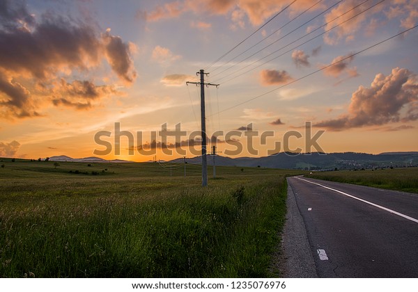 Sunset on the\
road