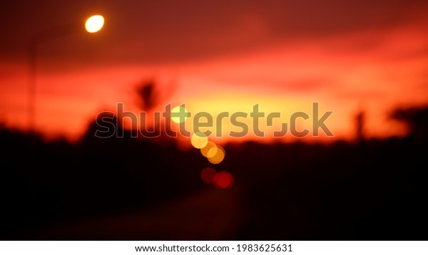Sunset on road blurred\
photo deep bokeh
