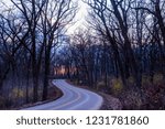 Sunset on the road through New Glarus Woods State Park in Wisconsin