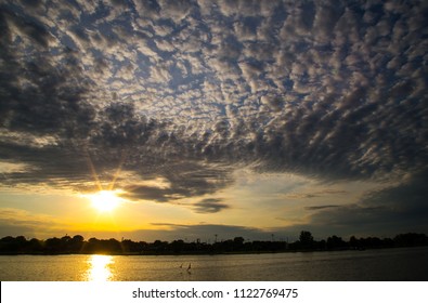 Sunset On The Saginaw River In Bay City, Michigan USA.