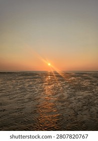 Sunset on Sandy Brancaster Beach in Norfolk