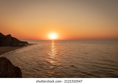 Sunset On The Sea Coast. Rocks And Sea. Beach, No People.